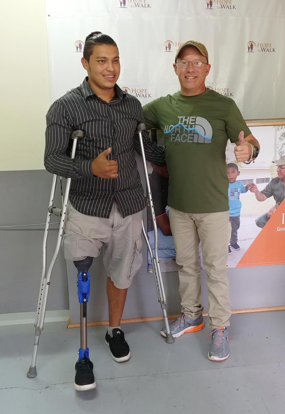 image of a man and a doctor standing together