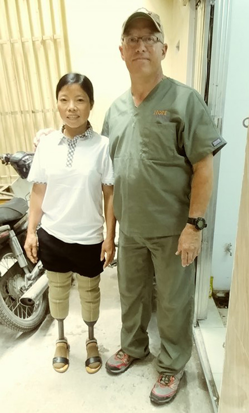 image of a woman and a doctor standing